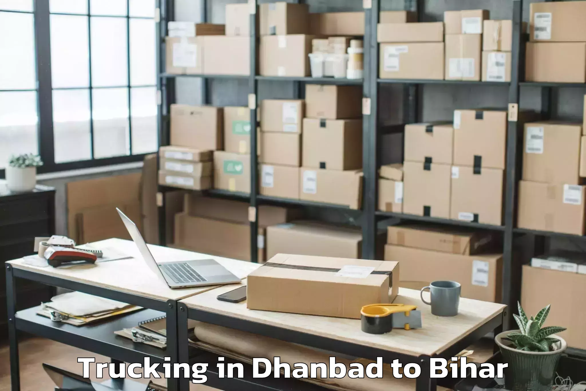 Book Dhanbad to Bharwara Trucking